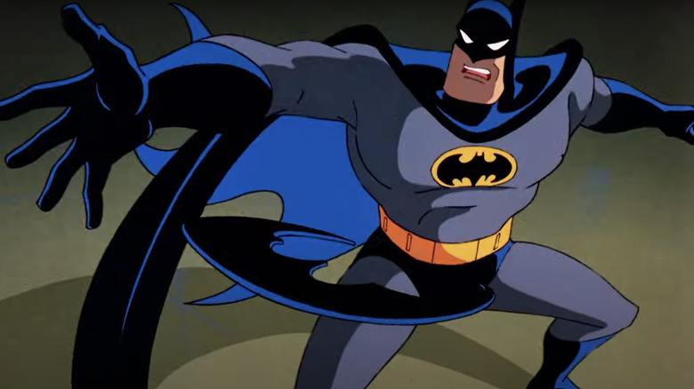 Batman tosses a batarang in Batman: The Animated Series