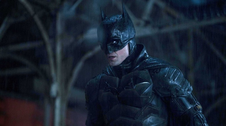 The Batman (2022) - Batman (Robert Pattinson) standing in the rain