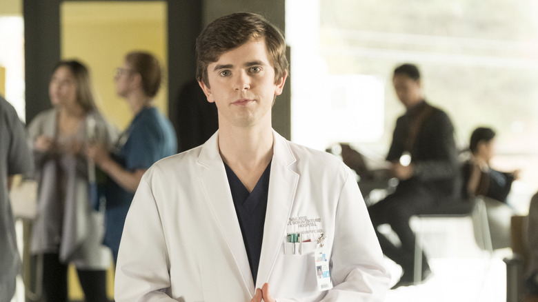 Freddie Highmore as Shaun Murphy wearing his lab coat on The Good Doctor