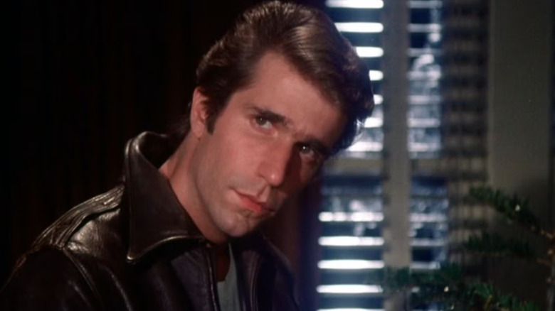 Henry Winkler as Fonzie tilting his head on Happy Days