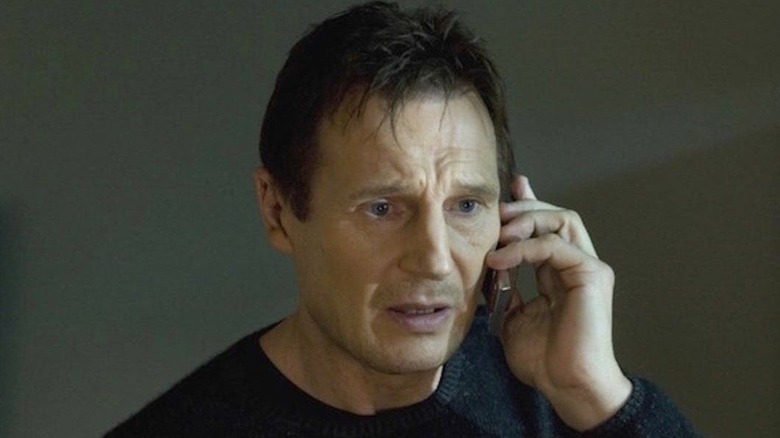 Liam Neeson on phone