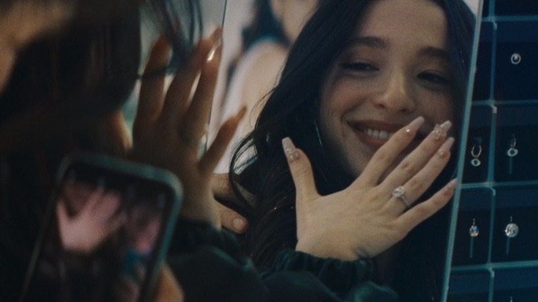 Anora Ani posing with her wedding ring