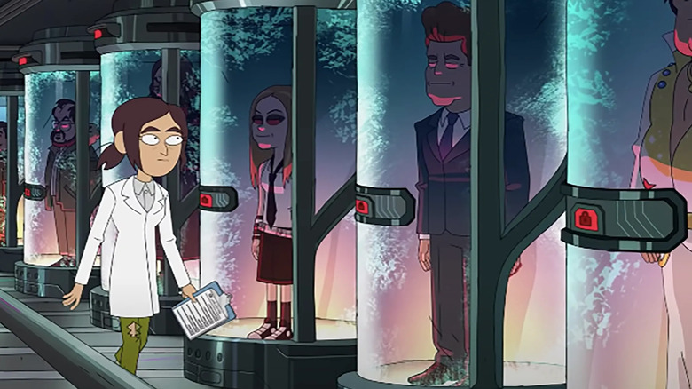 woman walks by clone vats inside job