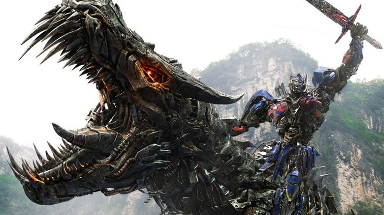 Optimus Prime rides Dinobot