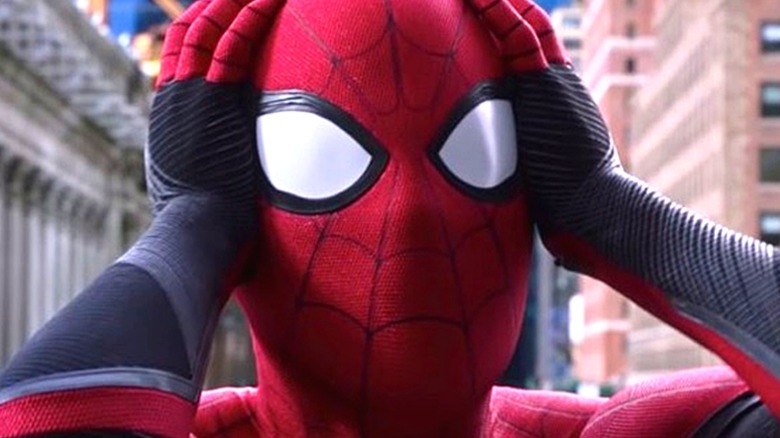 The MCU Spider-Man holds his head in worry