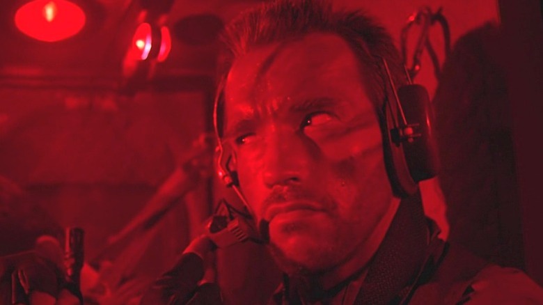 Predator Shwarzenegger bathed in red light