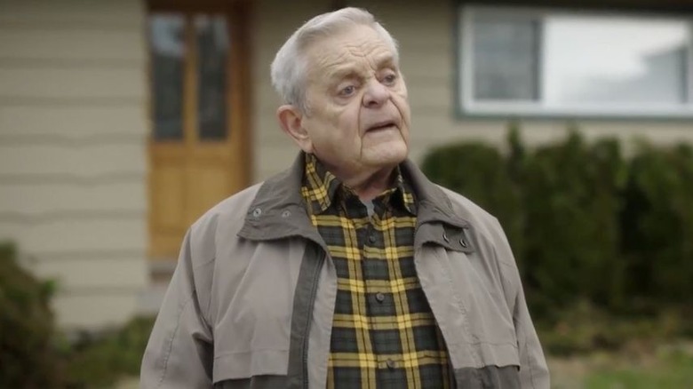 Mel Tuck as Auggie's neighbor in "Peacemaker"