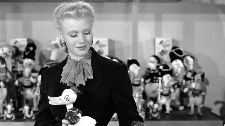 Rogers holding toy duck