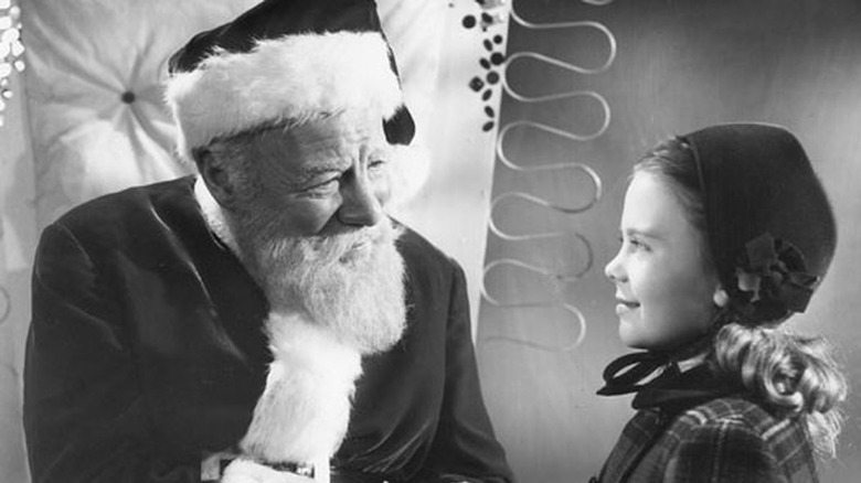 Kris Kringle charms Natalie Wood