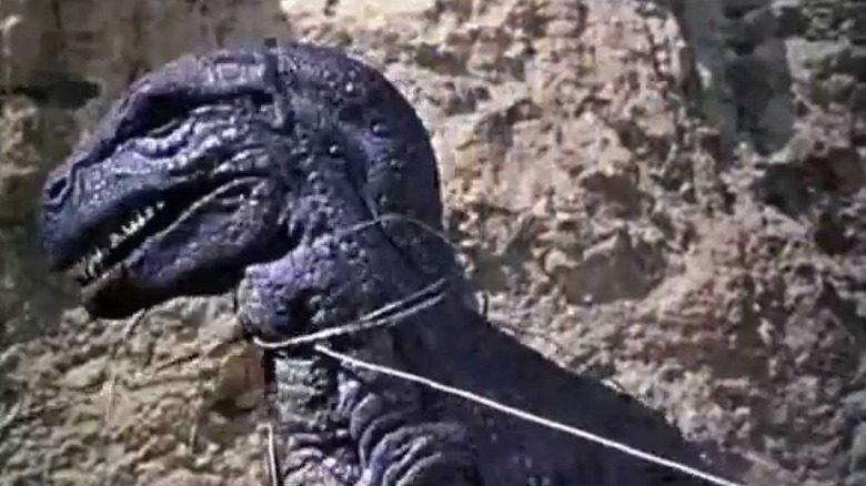 The Valley of Gwangi Allosaurus getting lassoed