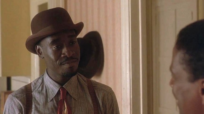 Don Cheadle smirking