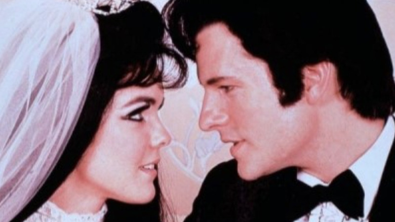 Susan Walters as Priscilla Presley and Dale Midkiff as Elvis Presley getting married in Elvis and Me