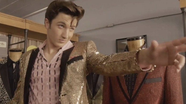 Drake Milligan as Elvis in a gold jacket on Sun Records