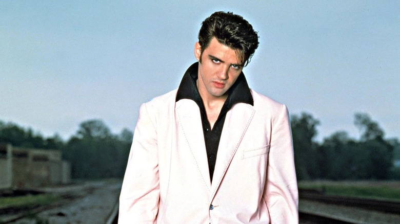 Michael St. Gerard on the train tracks as Elvis in Elvis