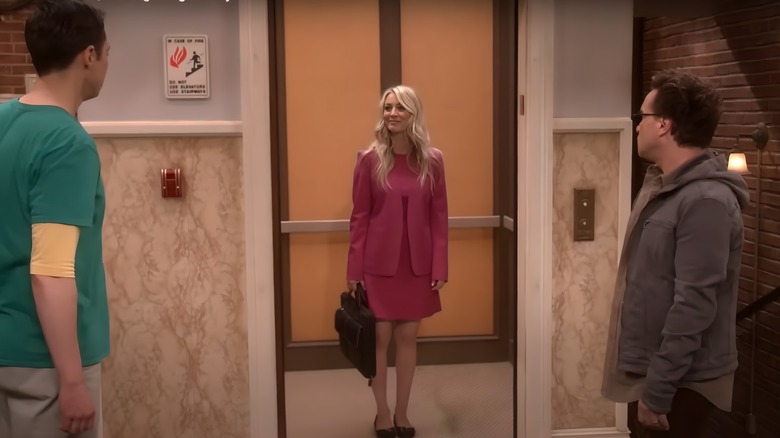 Sheldon and Leonard staring at Penny in an elevator in The Big Bang Theory