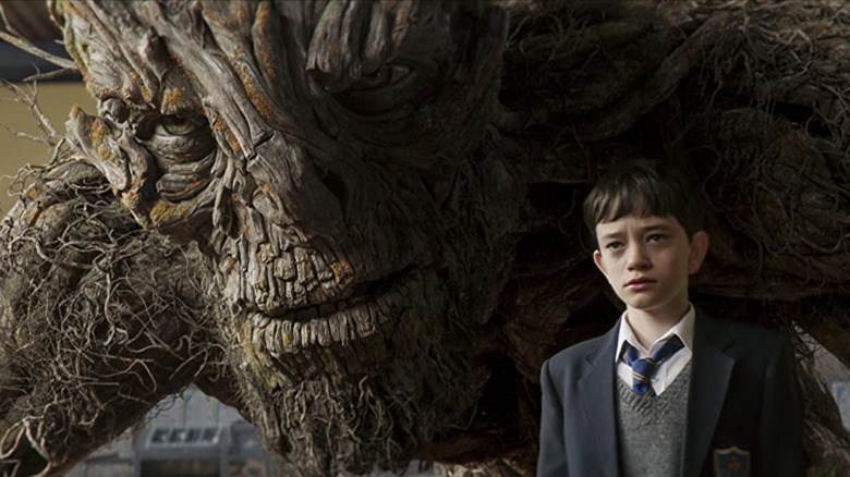 The monster standing behind Connor