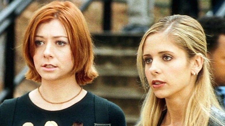 Alyson Hannigan and Sarah Michelle Gellar looking serious