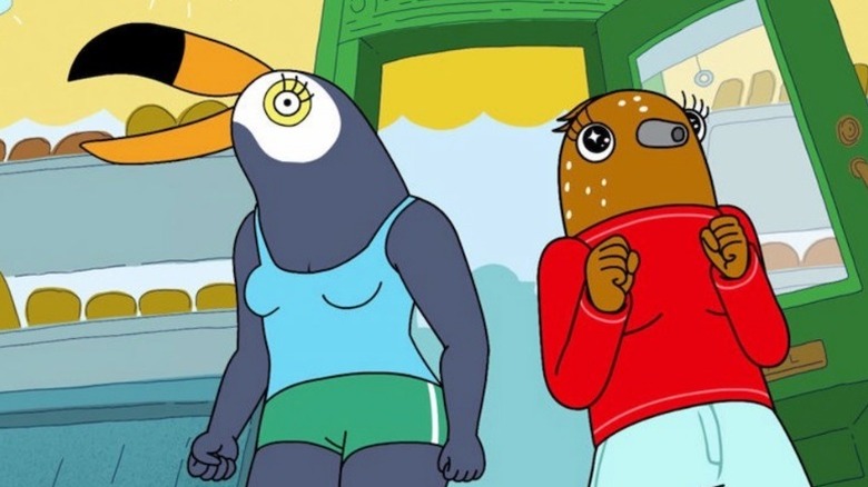 Tuca and Bertie standing in doorway