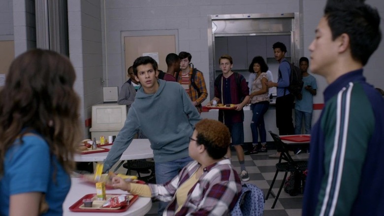Miguel coming into the cafeteria 