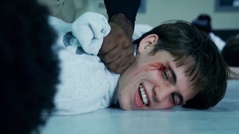 Robby bleeds after his fight in jail in Cobra Kai