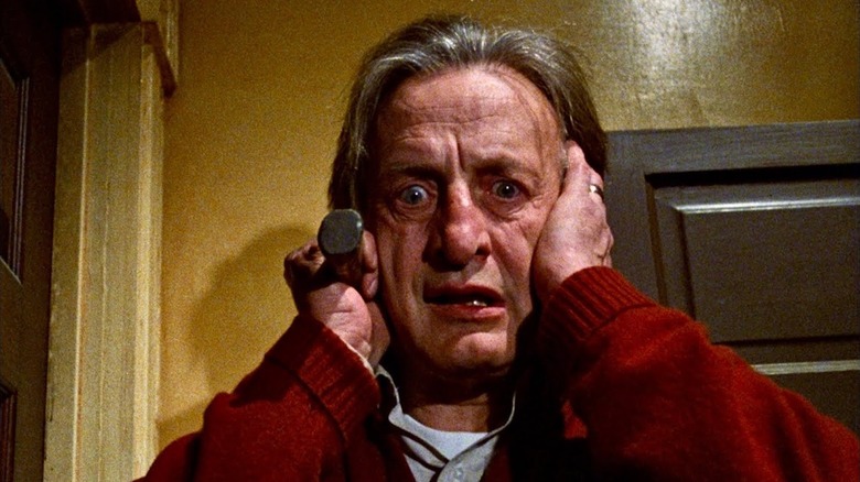 George C. Scott is a disheveled, terrified mess as John Russell in The Changeling