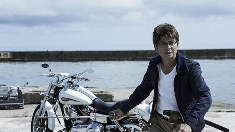 Yakuza holding katana