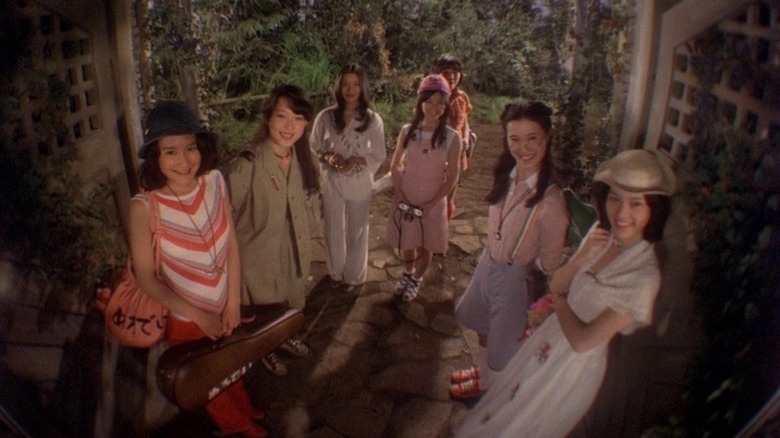 Girls arriving at haunted house