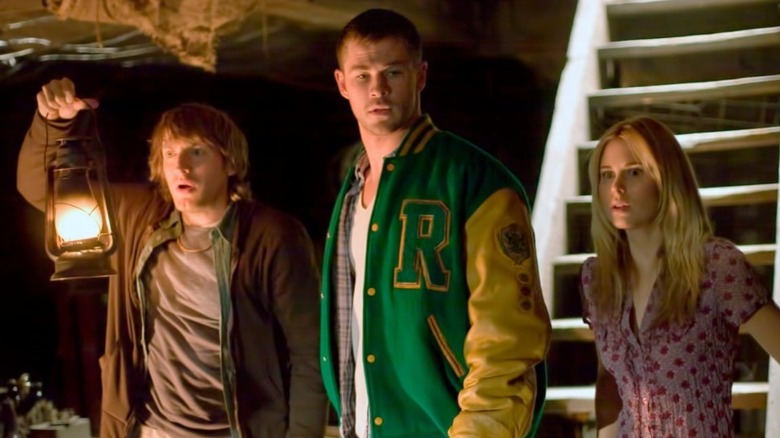 The cast of "The Cabin in the Woods" in basement