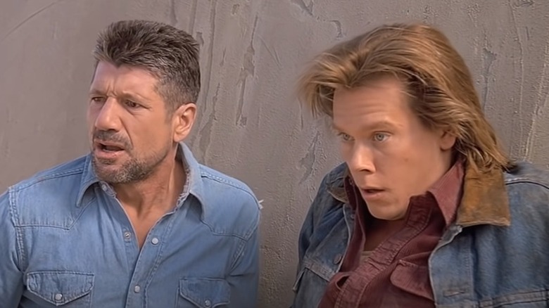 Fred Ward and Kevin Bacon looking shocked