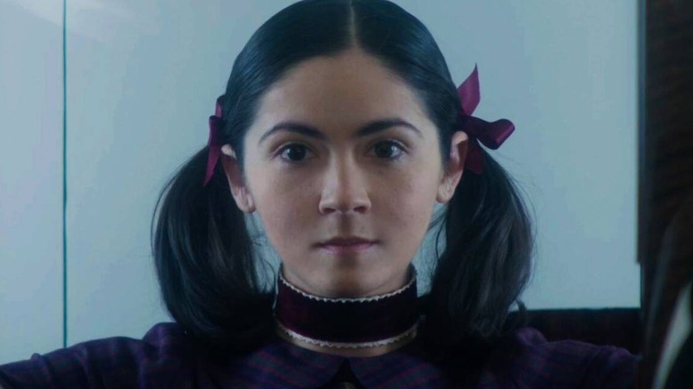 Orphan: First Kill's Esther staring pensively