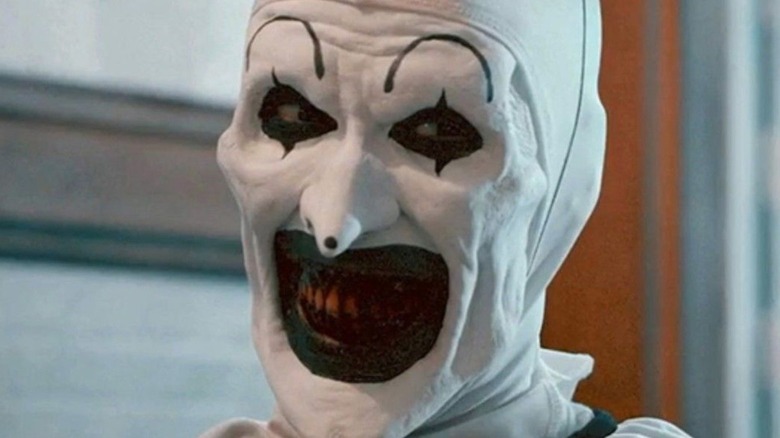 Terrifier 2's Art the clown smiling