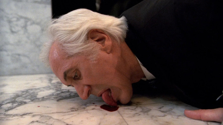 Jesús Gris licks blood off the floor in Cronos