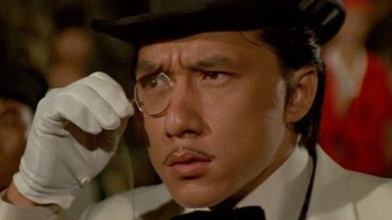 Jackie Chan moustache looks through monocle in Project A