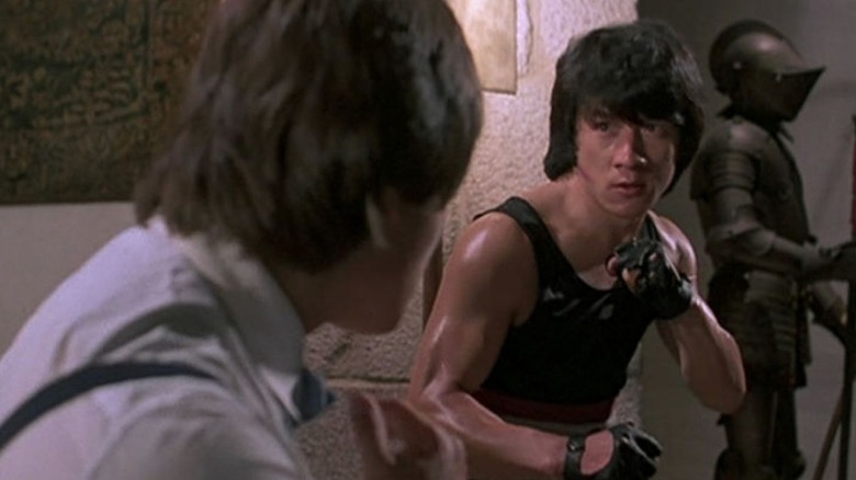 Thomas facing off against thug in Wheels on Meals