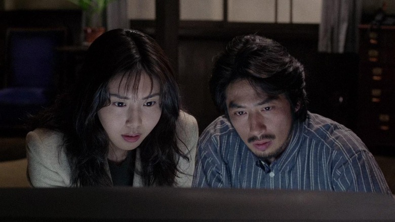 Ringu characters watch TV