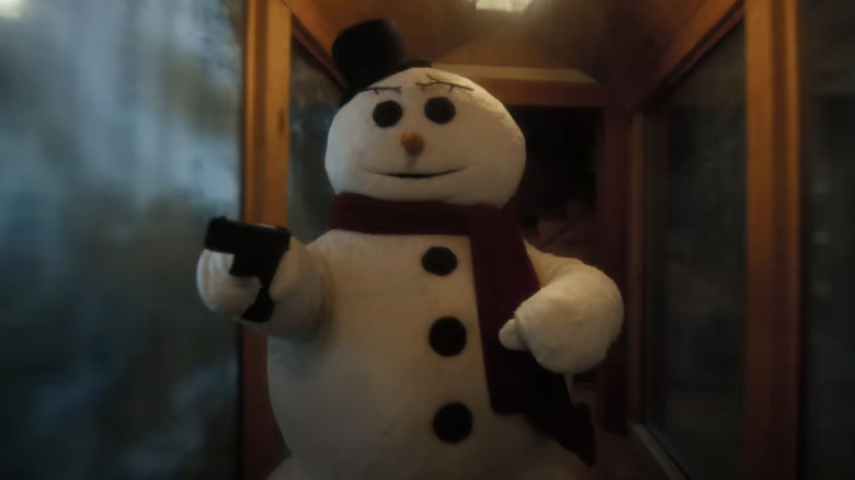 A snowman holding a gun in The Naked Gun
