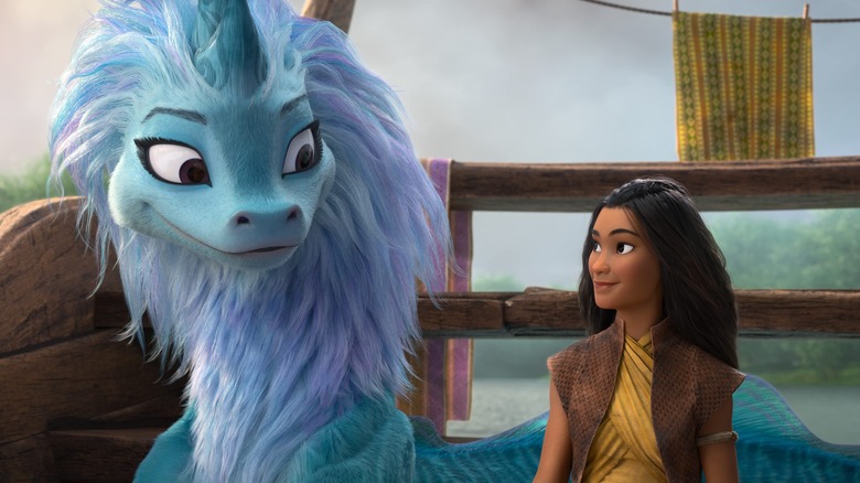 Sisu the Last Dragon and Raya sit together