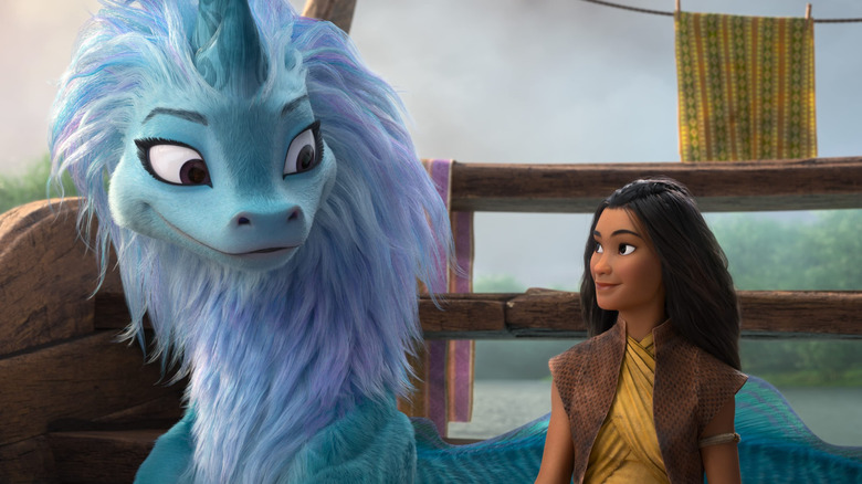 Sisu the Last Dragon and Raya sit together