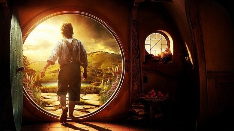 Hobbit walking out of door