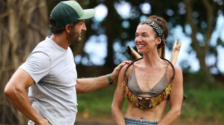 Parvati winning an immunity challenge with host Jonathan on Survivor: Australia V The World
