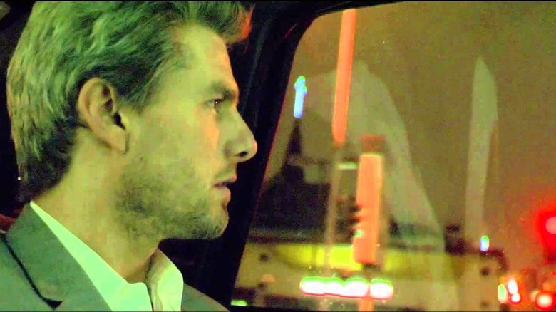 Vincent looking outside a cab window