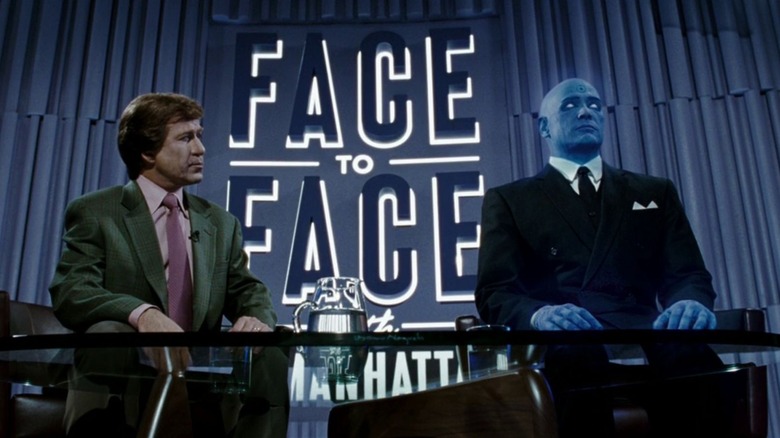 Ron Fassler as Ted Koppel interviews Billy Crudup as Dr. Manhattan in Watchmen