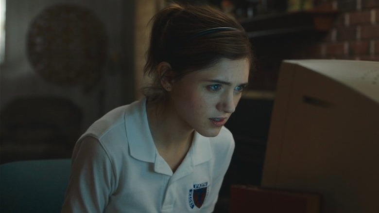 Natalia Dyer staring at computer 