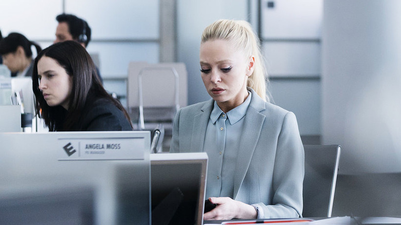Angela typing on laptop