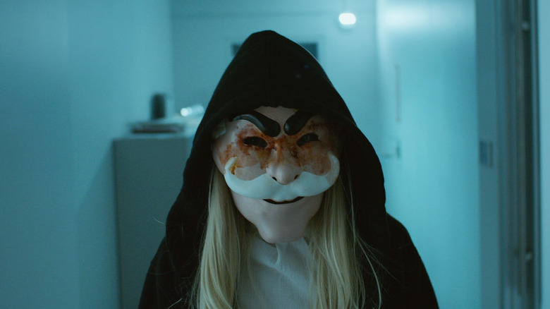 Angela wearing Dark Army mask