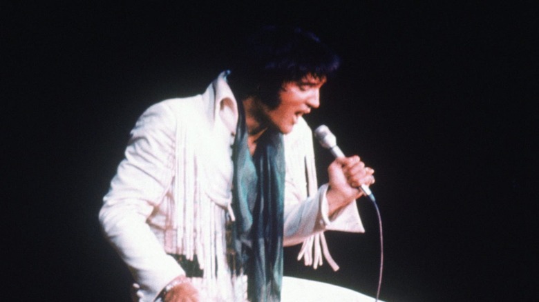 Elvis sitting down