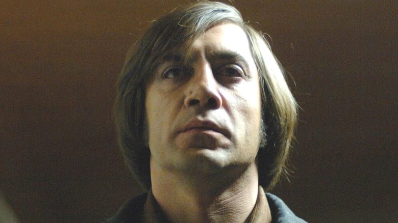 Javier Bardem points gun