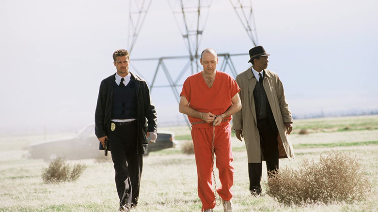 Brad Pitt and Morgan Freeman escort Kevin Spacey