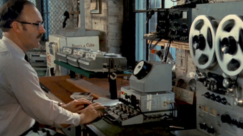 Gene Hackman listens to recording