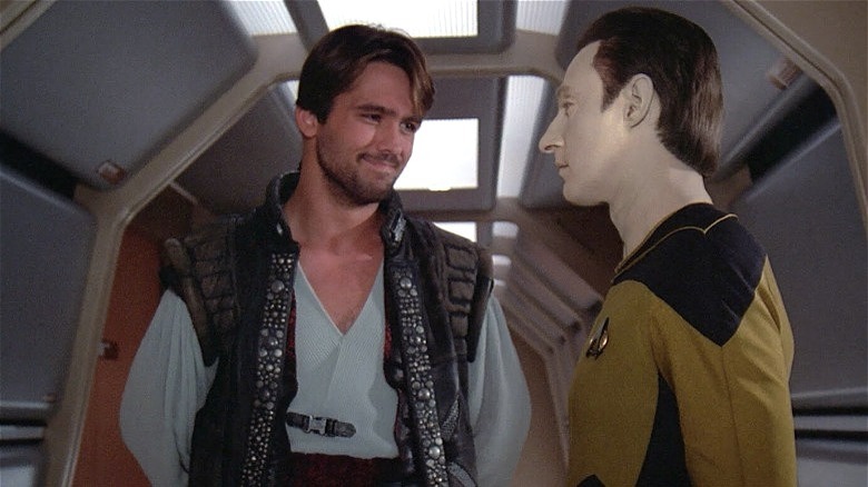 Okona smiles at Data